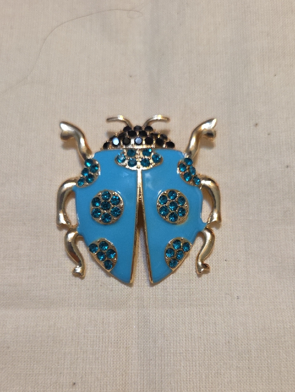 Blue Crystal Ladybug Brooch - Gold Tone